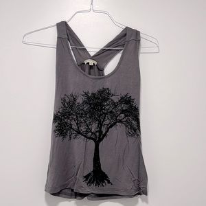 Never worn, size M, racerback cut, tank top.